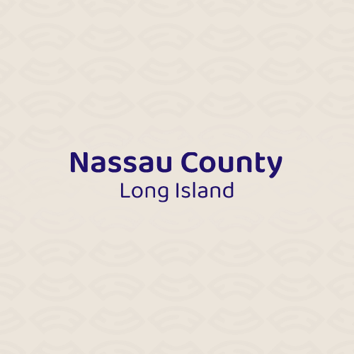 Text reading Nassau County, Long Island in dark blue on a light patterned background.