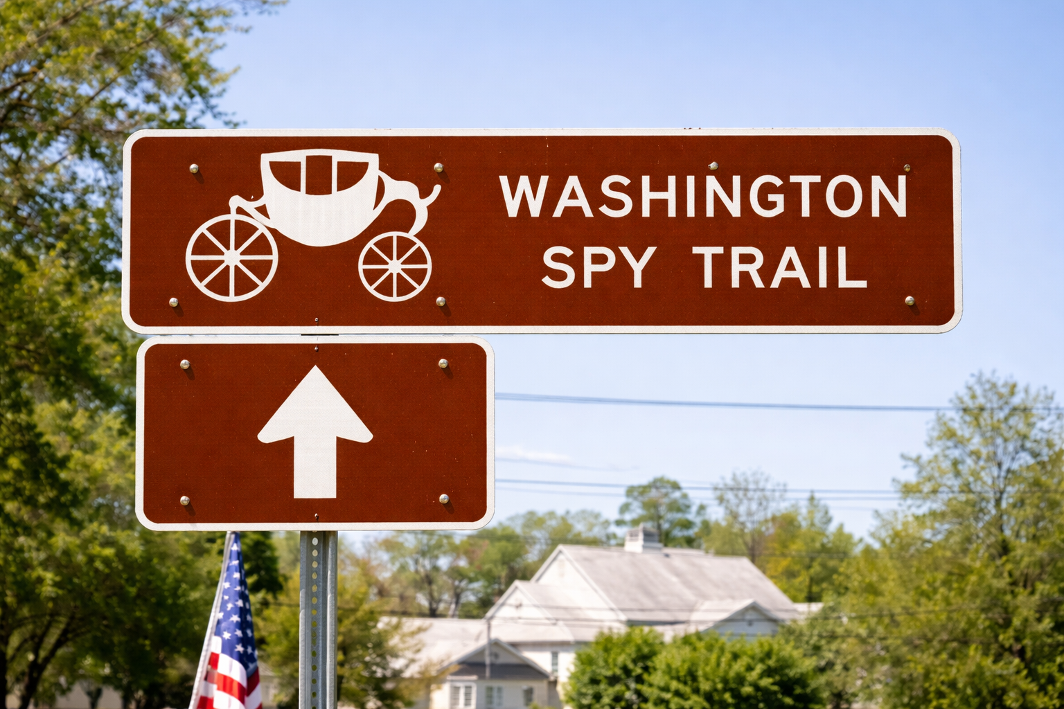 Washington Spy Trail historic marker sign on Long Island pointing to Revolutionary War spy sites connected to George Washington’s Culper Spy Ring.